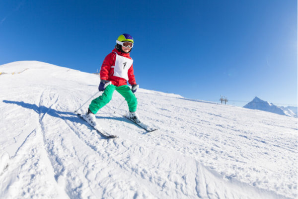 Young pupil skiing on school ski trip Young pupil skiing on school ski trip