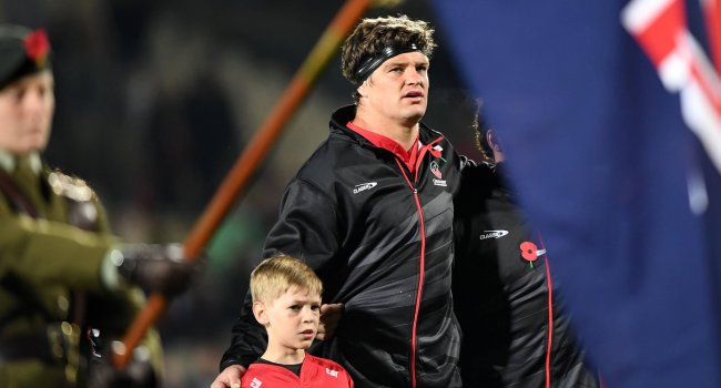 CHRISTCHURCH, NEW ZEALAND - APRIL 26: Captain Scott Barrett of the Crusaders lines up for the national anthem prior to the round ten Super Rugby Pacific match between the Crusaders and Melbourne Rebels at Apollo Projects Stadium, on April 26, 2024, in Christchurch, New Zealand. (Photo by Kai Schwoerer/Getty Images)